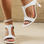 Women's open toe flare heel sandals by Trendsi featuring faux leather high heels and a comfortable, stylish design.