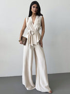 Women's lace-up V-neck vest and matching pants two-piece set by FitiqueFit, featuring a stylish and elegant commuter outfit.