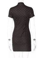 Polka dot cut-out front mini dress by Shopimist featuring a stylish design and playful pattern, perfect for summer or night outings.