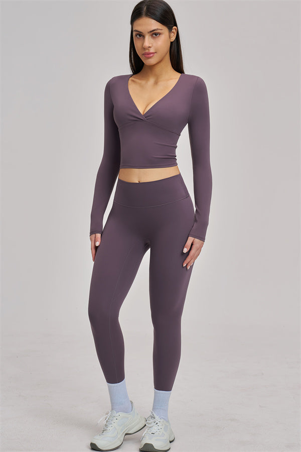 Fitglutes Activewear long sleeve crop top with a fitted design, perfect for gym and workout sessions.