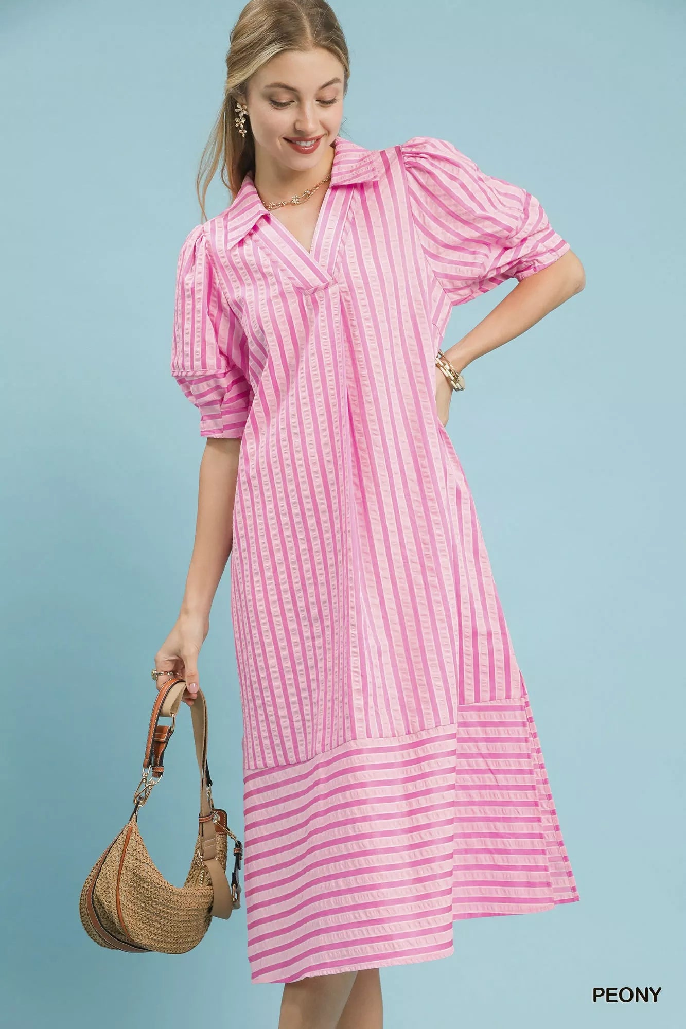 Striped puff sleeve midi dress from Umgee, featuring a stylish silhouette with puffed sleeves and a flattering midi length.