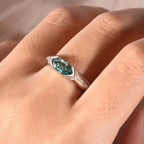 Sterling silver ring with 1 carat moissanite gemstone, showcasing a sparkling center stone and elegant band design.
