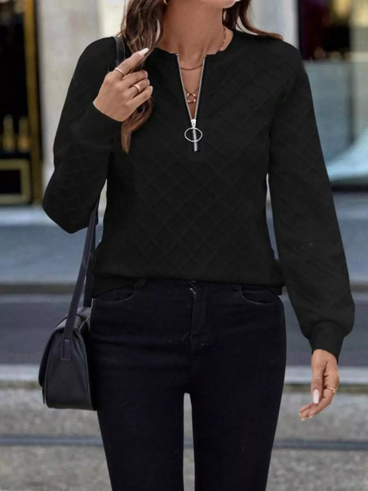 Textured quarter-zip sweatshirt in plush fabric by Plush Fashion Hub, shown in a cozy, stylish fit.