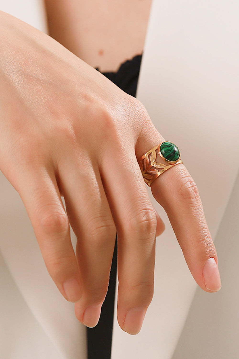 18k gold plated malachite leaf ring with detailed green gemstone design, showcasing elegant jewelry craftsmanship.