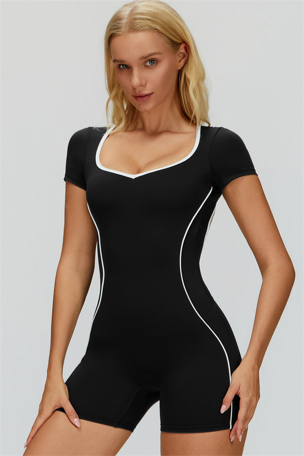 Fitglutes Activewear The Whisper Romper in black, featuring a sleek workout romper with supportive fit and stylish design.