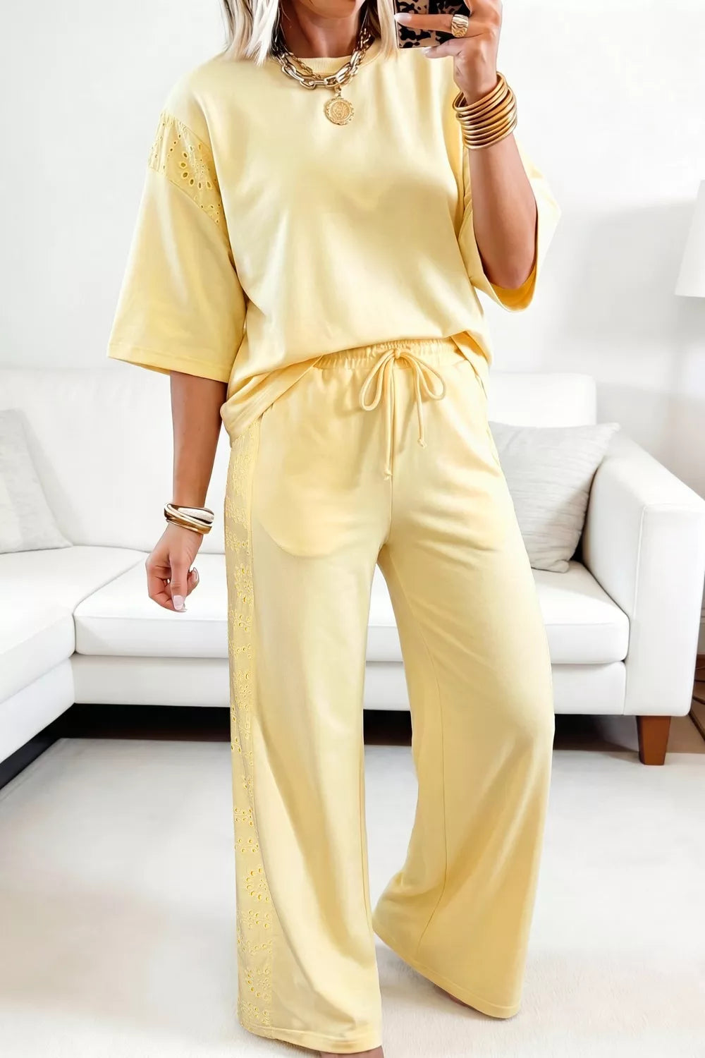 Plush Fashion Hub rings set featuring a half sleeve top and drawstring pants with decorative rings details.