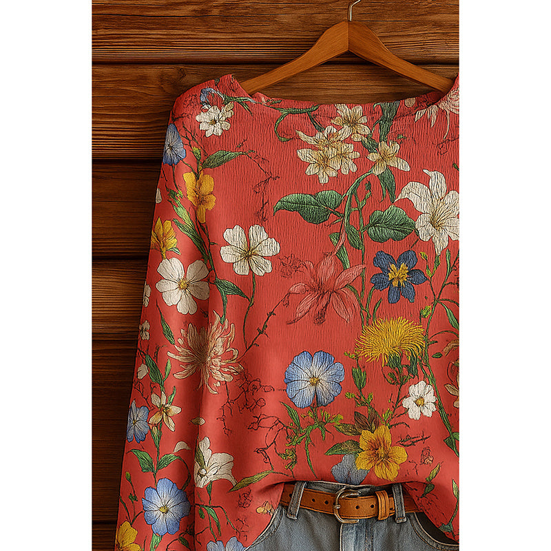 Women’s fall wildflower print long sleeve T-shirt by Plush Fashion Hub, featuring a colorful floral pattern on casual wear.