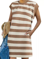 Plus size casual striped short sleeve mini dress by Trendsi, featuring a relaxed fit and vibrant vertical stripes.