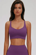 Fitglutes Activewear sports bra and leggings set featuring the Kinetic Zip Cross Back design, shown in a sleek three-piece workout outfit.