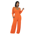Modern cape-sleeve tailored jumpsuit by eprolo, featuring a sleek design and stylish cape sleeves, perfect for trendy tops.