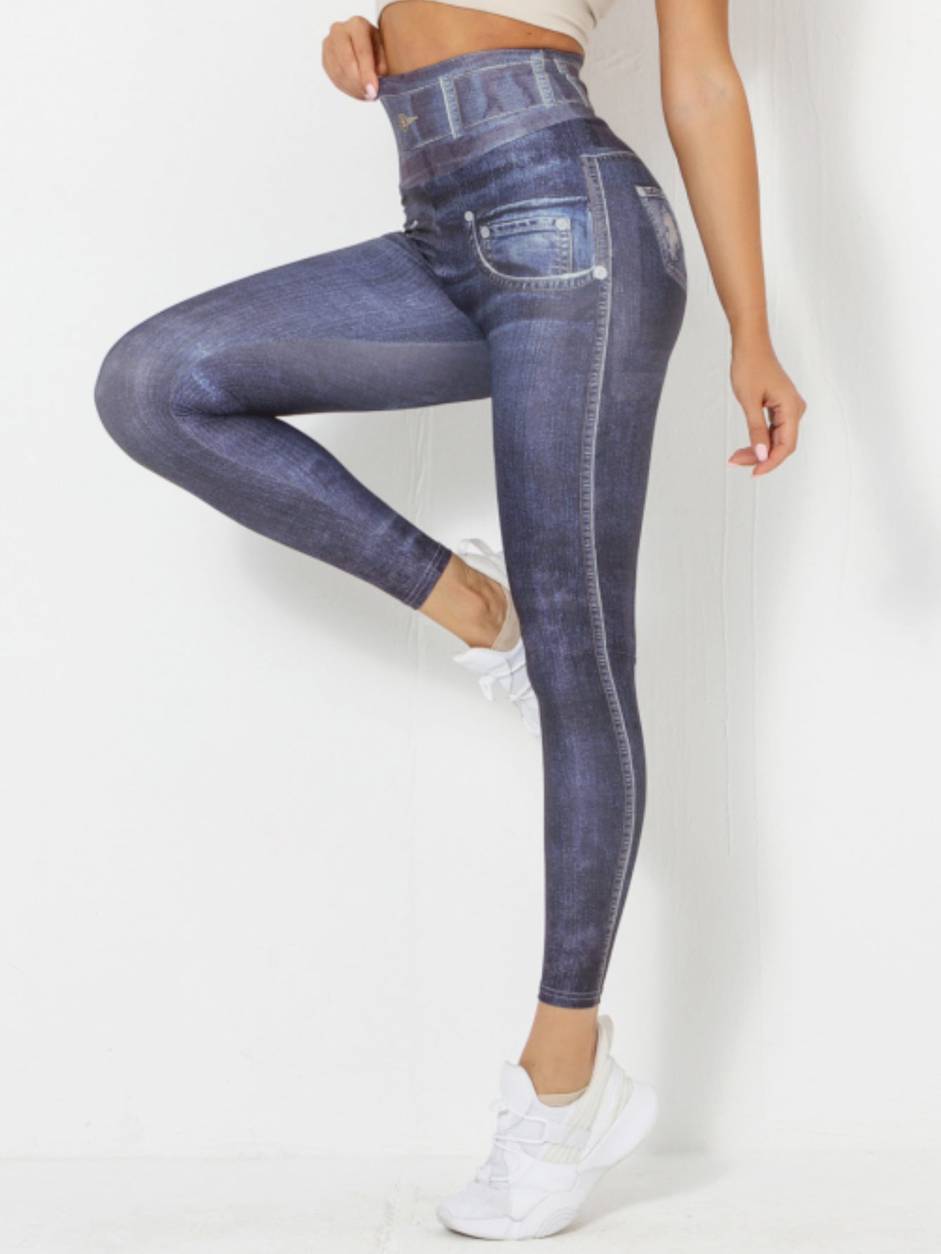 Denim-look peach yoga leggings by FitiqueFit, slim fit fitness workout pants shown on a model for active wear and style.