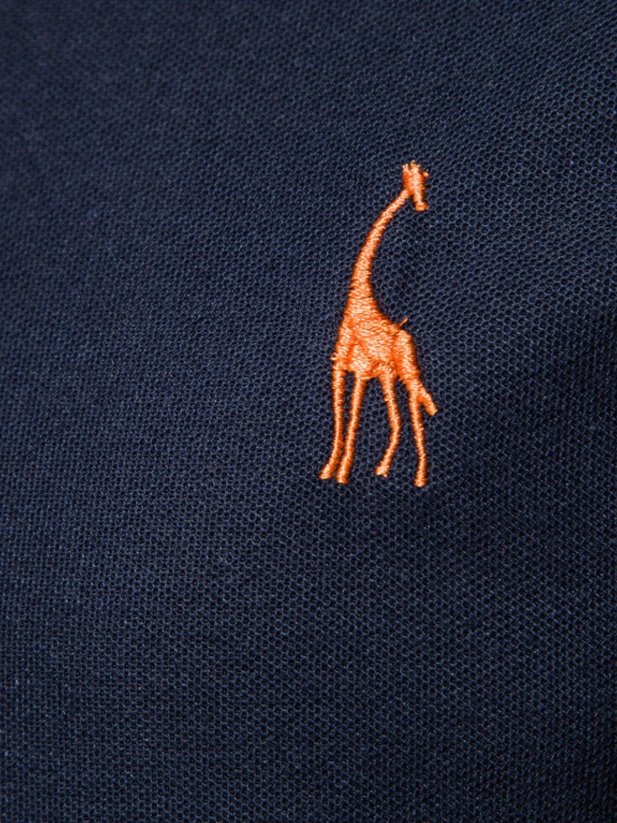 Men's full-size contrast trim classic polo shirt by Trendsi, showing a navy polo with white collar and sleeve accents.