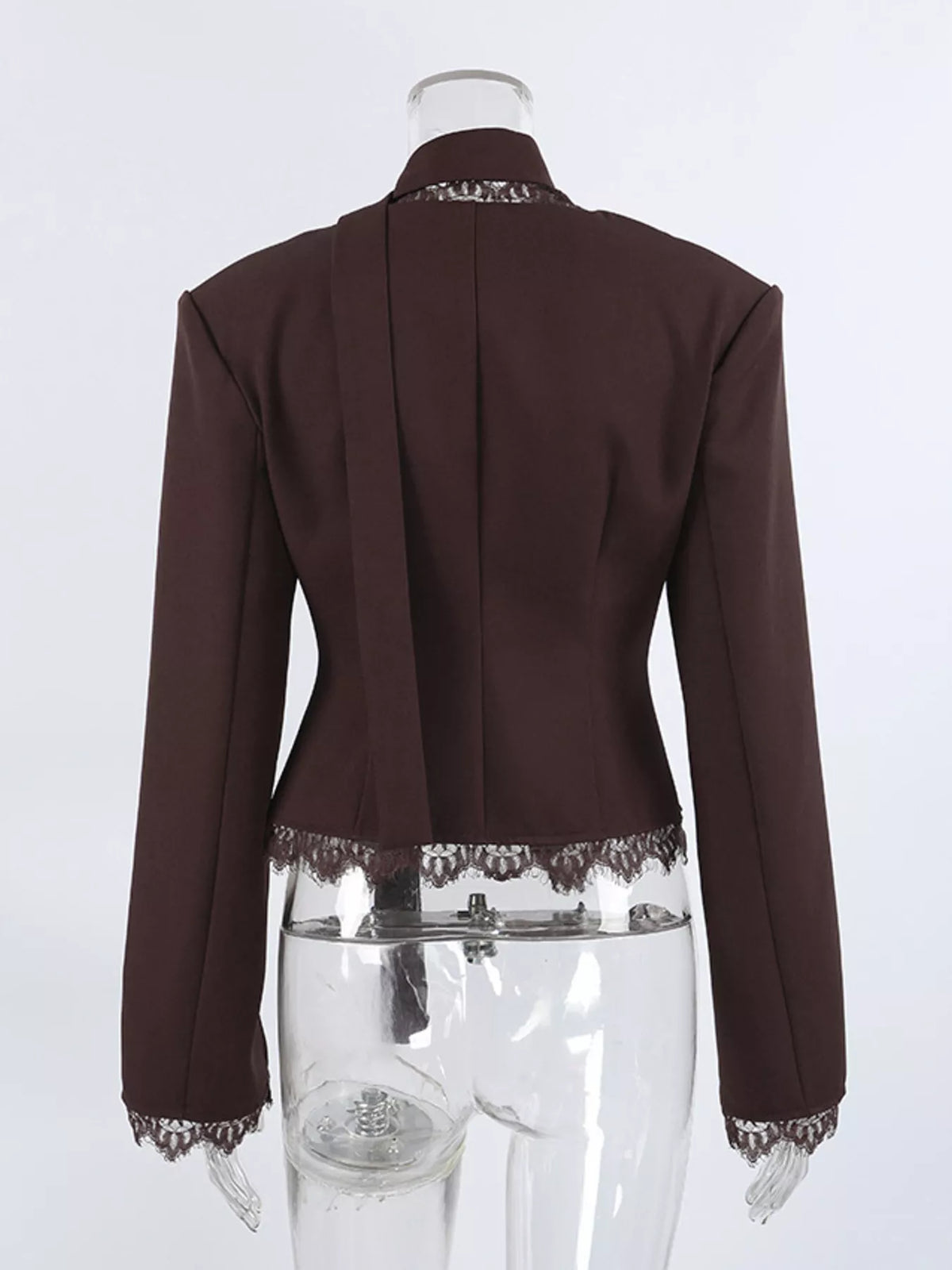 Lace trim button-up blazer by Trendsi featuring a tailored fit, lace accents, and classic collar in a stylish, professional design.