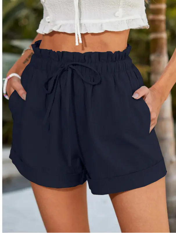 Light gray minimalist women's drawstring shorts with side pockets from Plush Fashion Hub, featuring a comfortable fit and casual style.
