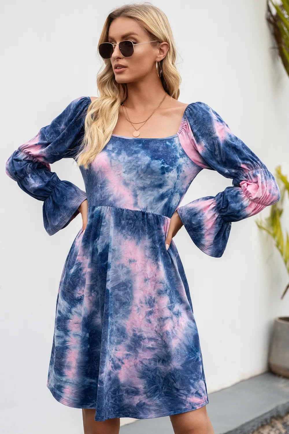 Ivy Lane tie-dye square neck dress with flounce sleeves, featuring a vibrant pattern and a relaxed fit for casual wear