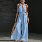 Women’s V-neck halter neck wide-leg jumpsuit by FitiqueFit, styled casually with a relaxed fit and flowing fabric.