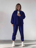 Women's loose fit crewneck sweatshirt and jogger pants two-piece set by Plush Fashion Hub, casual and comfortable outfit.
