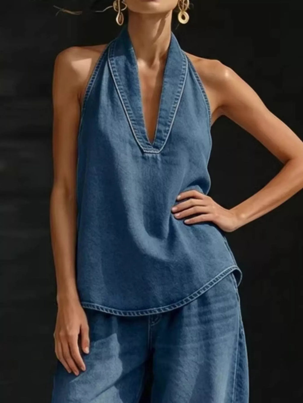 Women's plus size halter neck top and wide-leg pants two-piece set by Trendsi, casual dress with stylish fit and comfortable fabric.