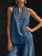 Women's plus size halter neck top and wide-leg pants two-piece set by Trendsi, casual dress with stylish fit and comfortable fabric.