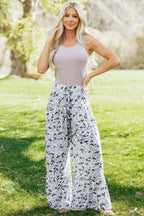 Hope Wide Leg Casual Pants by Threaded Pear, stylish beige culottes with a relaxed fit and wide-leg design.