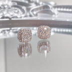 Sterling silver stud earrings with 1 carat moissanite gemstones, featuring a classic and elegant design.