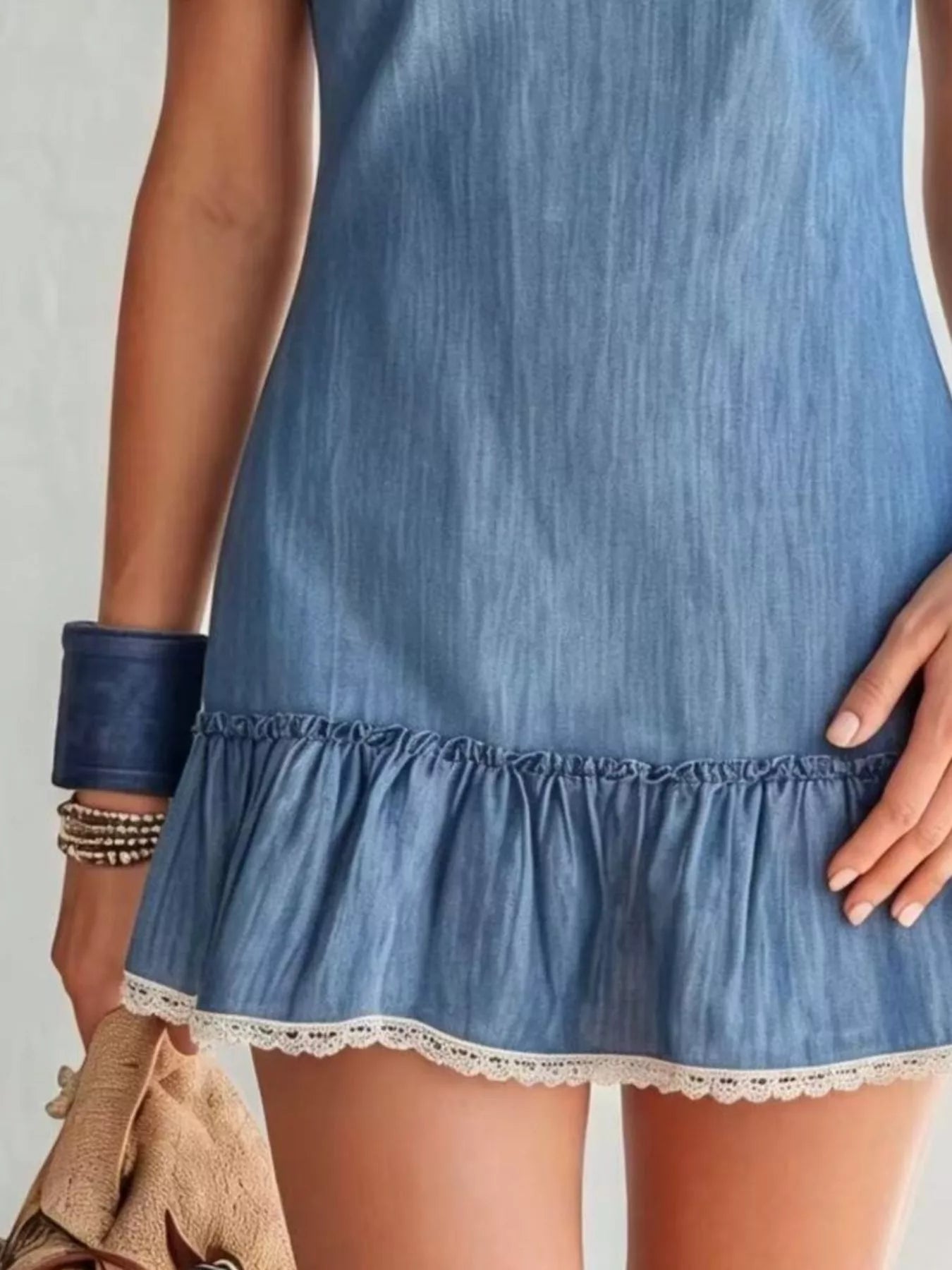 Off-shoulder mini dress with lace details from Shopimist, featuring a fitted silhouette and elegant lace accents on the neckline.