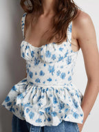 Floral print ruffle hem tank top from Shopimist featuring a sleeveless design and flowy ruffled hem, perfect for casual wear.