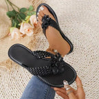 Floral accent braided thong sandals by Shopimist featuring colorful floral details and woven straps for warm-weather style.