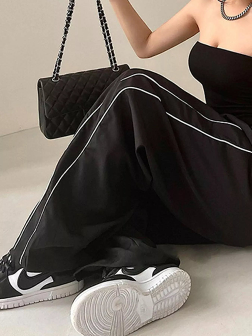 Women's lightweight high-rise wide leg dress pants with elastic waist, stylish and comfortable trousers by Trendsi.