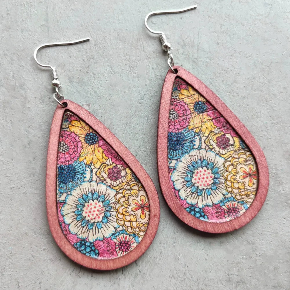 Floral wood teardrop earrings from Plush Fashion Hub featuring natural wood and colorful floral designs.