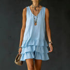 V-neck sleeveless midi dress by FitiqueFit in seven colors, casualwear style, shown on a model in a relaxed outdoor setting.