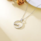 925 sterling silver mountain-shaped ring holder and pendant necklace with round shape, featuring intricate mountain details.