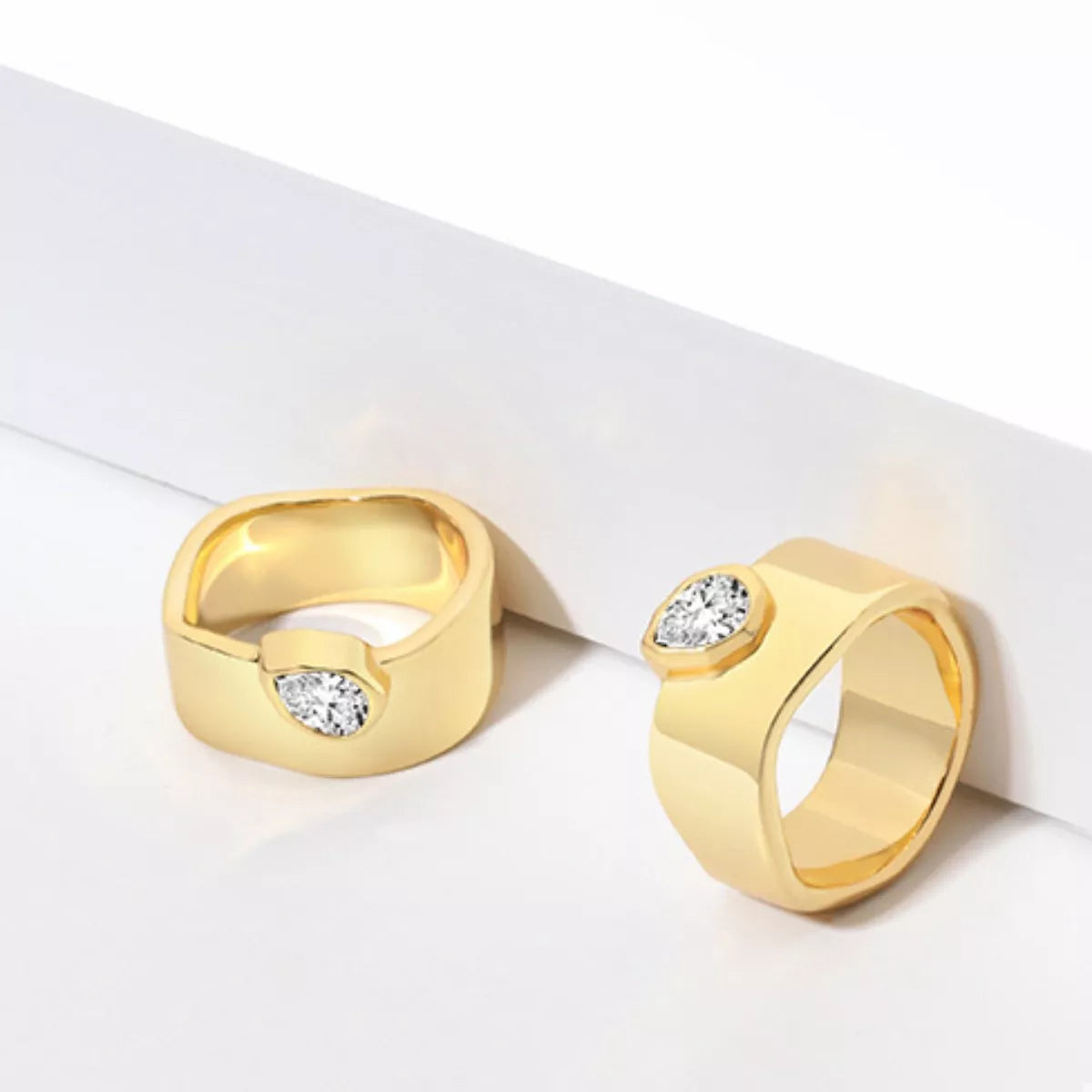18K gold-plated minimalist ring from Plush Fashion Hub, showcasing a sleek and simple design on a plain background.