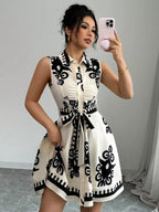 Sleeveless ruched printed tie waist dress by Shopimist, featuring a V-neck, floral pattern, and flattering silhouette.
