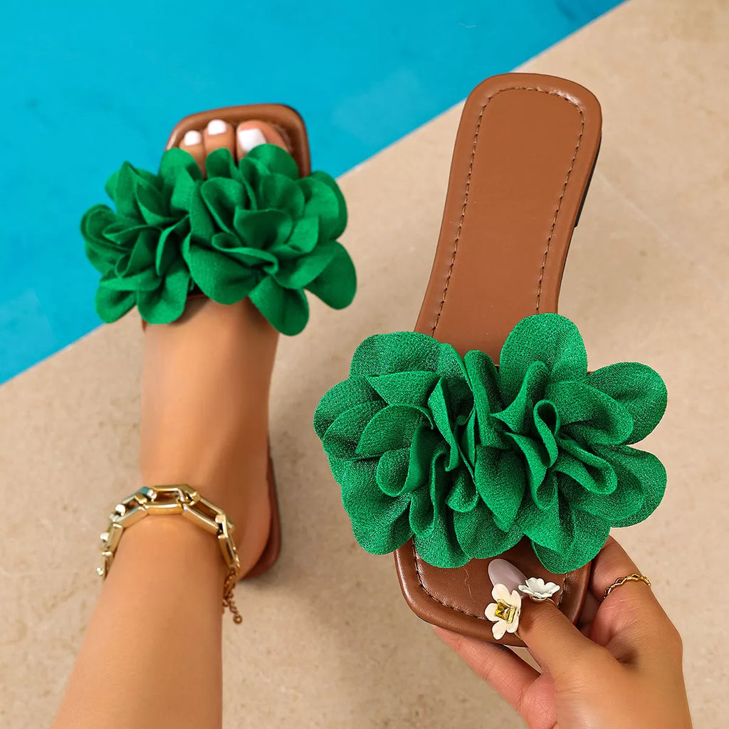 Floral embellished flat sandals by Plush Fashion Hub featuring colorful flower details and comfortable open-toe design.