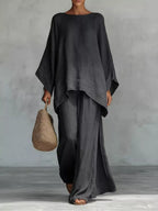 Plus size Trendsi full size round neck top and wide leg pants set, stylish and comfortable pant set for casual wear.