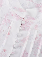 Floral print layered ruffle dress by Shopimist featuring a flowy design and feminine ruffle details perfect for spring or summer.