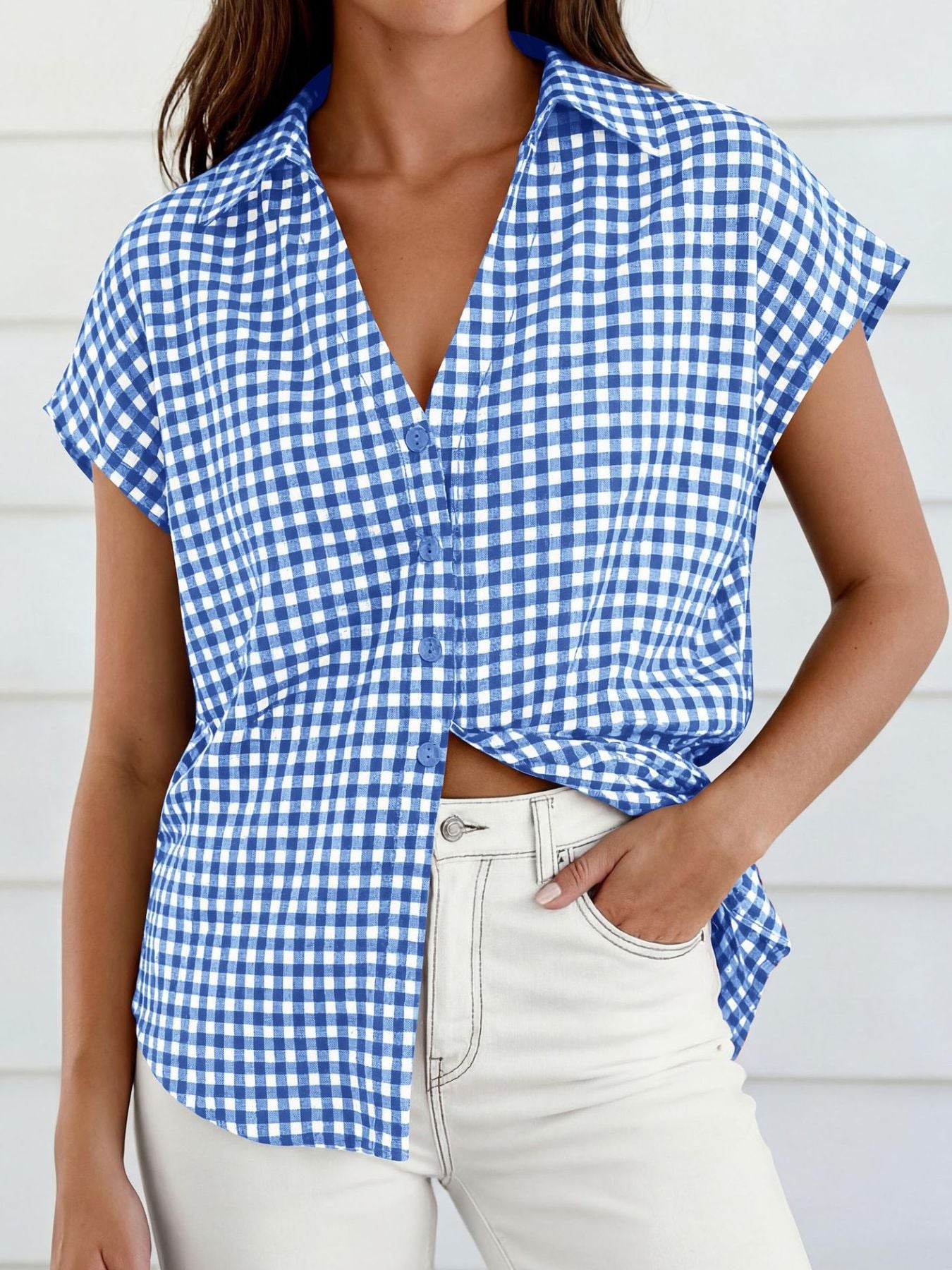 Women's gingham print button-down shirt with tie detail by Trendsi, featuring a classic design and short sleeves.