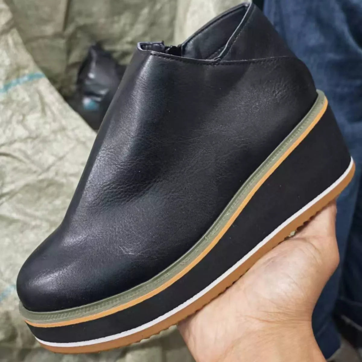 Women's ankle wedge boots with zipper, trendy Trendsi shoes featuring a stylish heel and ankle-high design.