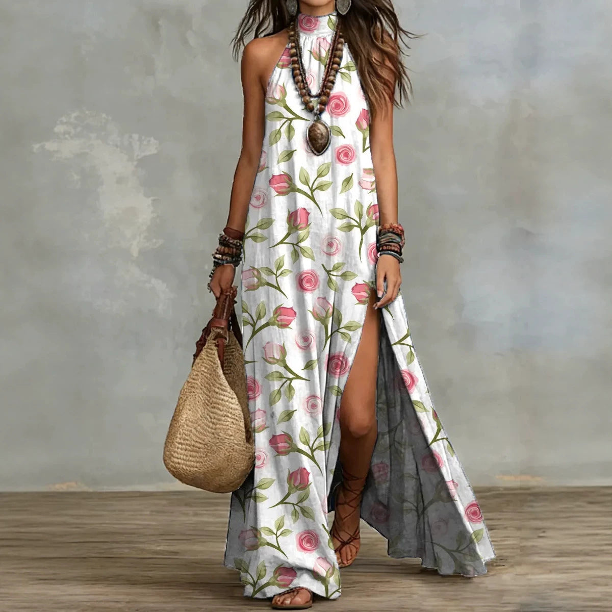 Women's sleeveless floral print maxi dress by FitiqueFit, featuring a split design and vibrant flower pattern.