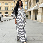African-inspired striped loose long dress in various colors, featuring a relaxed fit and vibrant pattern from Plush Fashion Hub.