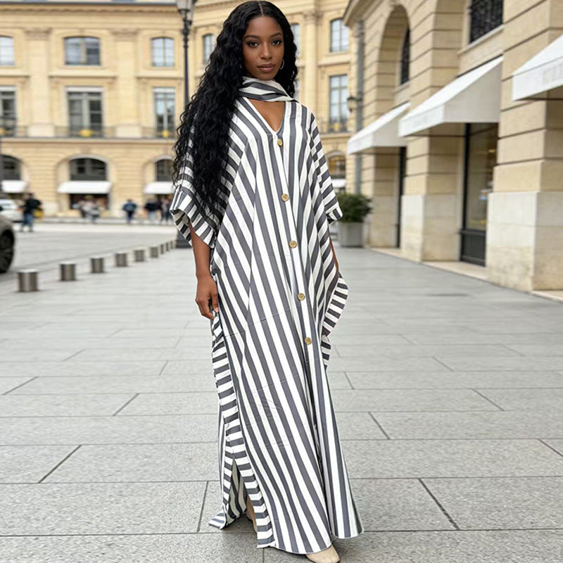 African-inspired striped loose long dress in various colors, featuring a relaxed fit and vibrant pattern from Plush Fashion Hub.