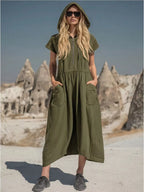 Full size hooded midi dress by Shopimist featuring a zipper, pockets, and a hood, made for plus-size women, shown in the image.