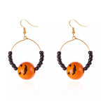 18K gold-plated Halloween bead earrings with festive orange and black beads, featuring spooky themed design, by Shopimist