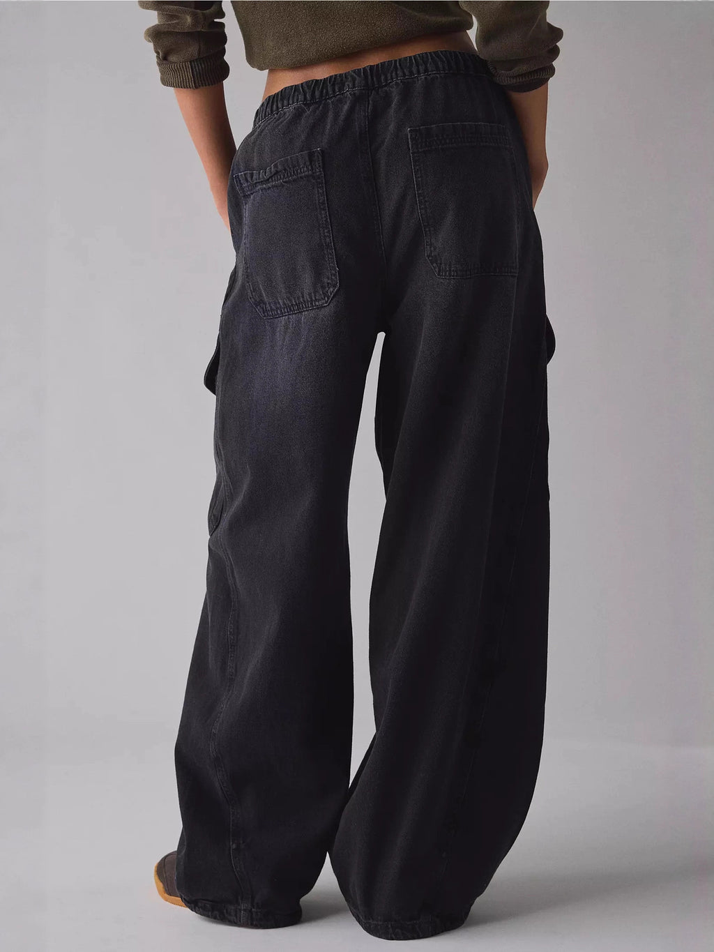 Women's relaxed fit cargo denim jeans with drawstring waist and utility-style pockets, by Trendsi.