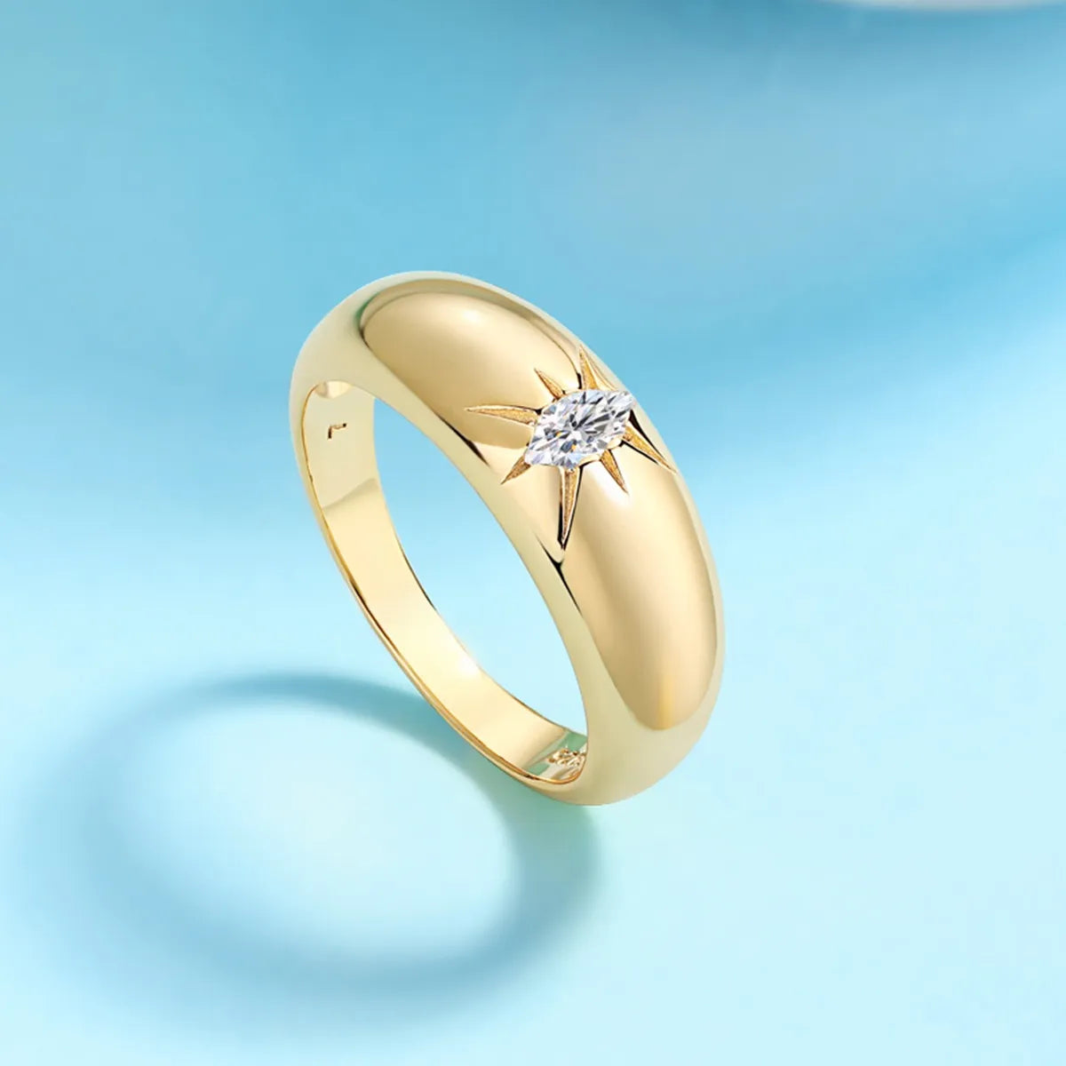 925 sterling silver moissanite ring with a sparkling gemstone set in a detailed band, showcasing elegant jewelry design.