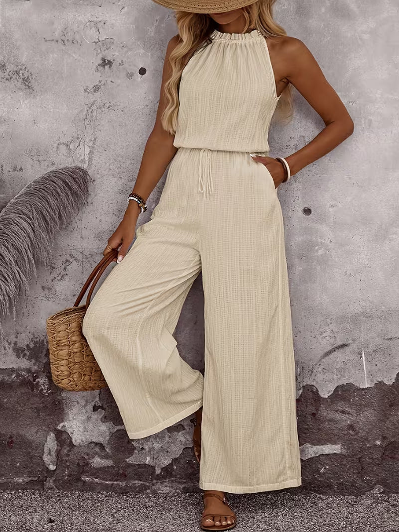 Women's sleeveless vest and casual pants two-piece set by Plush Fashion Hub, featuring a draped neck and relaxed fit for casual wear.