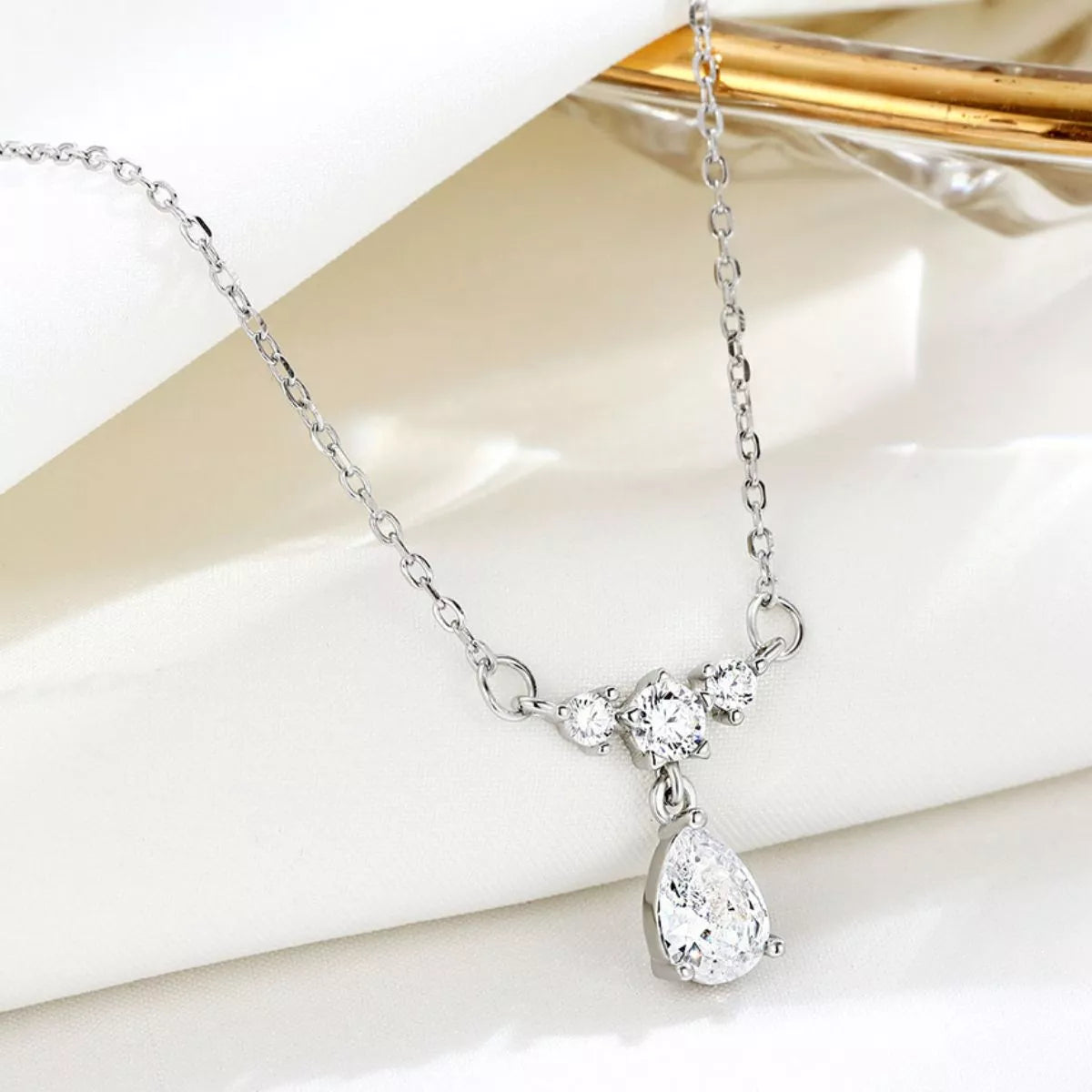 Sterling silver zircon teardrop necklace with a delicate chain, showcasing a sparkling teardrop pendant.