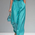 Women’s sleeveless vest and wide-leg pants casualwear set by FitiqueFit, featuring a stylish vest and flowy wide-leg pants.