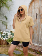 Trendsi half zip short sleeve hooded top in soft fabric, featuring a relaxed fit and casual style, shown in dark color.